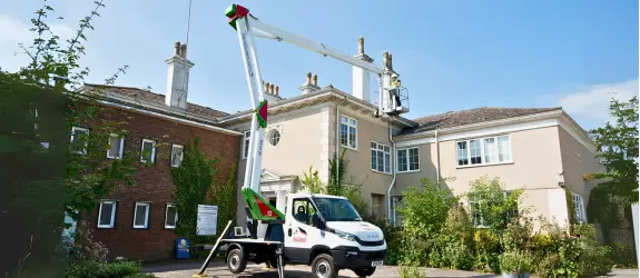 using our cherry picker on a commercial gutter cleaning job in Filwood, Dorset